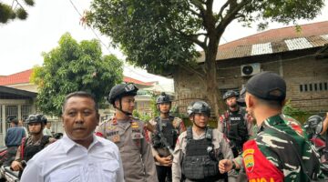 100 Brimob Siaga Penuh, Kawal Suara Rakyat hingga TPS: Demokrasi Desa Dijaga dengan Pengorbanan dan Kesetiaan